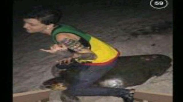 Police arrest woman sought for allegedly riding sea turtles