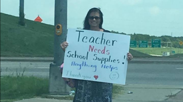 Photos of teacher panhandling for school supplies go viral