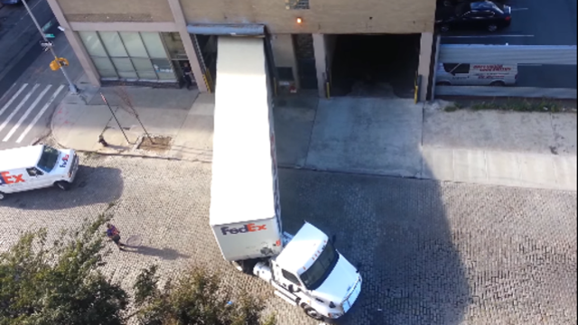 FedEx trucker completes perfect reverse park in 18-wheeler