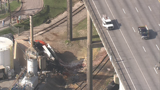 Driver of 18-wheeler pronounced dead, after crashing off Ship Channel Bridge onto building