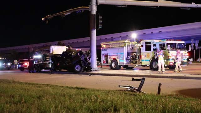 Driver injured, horses killed when truck crashes into pillar