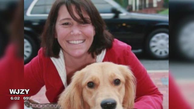 Woman and dog killed by garbage truck, driver now faces charges