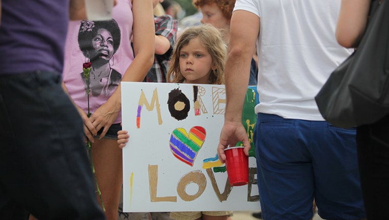 265cbe91-061316_vigil_for_victims_Dr. Phillips Center_Orlando_FL_9_1528773281618.jpg-402429.jpg