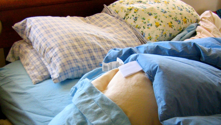 e009cafe-Stock image of bed by Liz West via Flickr-404023