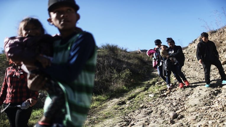 8ed9b7c9-GETTY migrant resized_1545838964547.png-405538.jpg