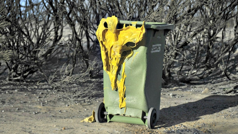 b23ba536-GETTY trash man burnt melted 3_1551223898027.jpg-404023.jpg