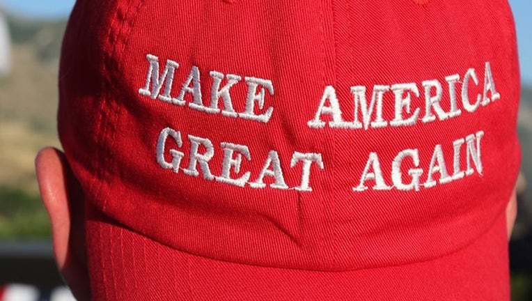 56334bc5-GETTY_ maga hat make america great again hat_022819_1551375604690.png-402429.jpg
