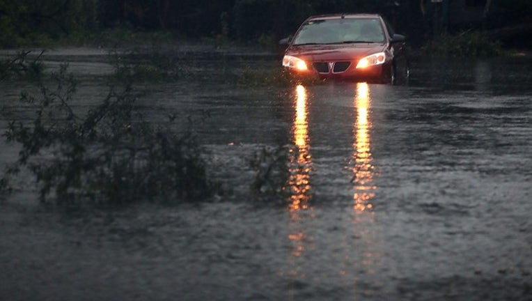 b6ac4435-GETTY_florence flooded car_091618_1537119194476.png-403440.jpg