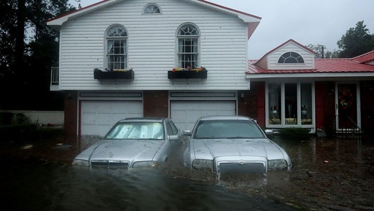 b9fae9ad-GETTY_florence flooding_091618_1537108055839.png-403440.jpg