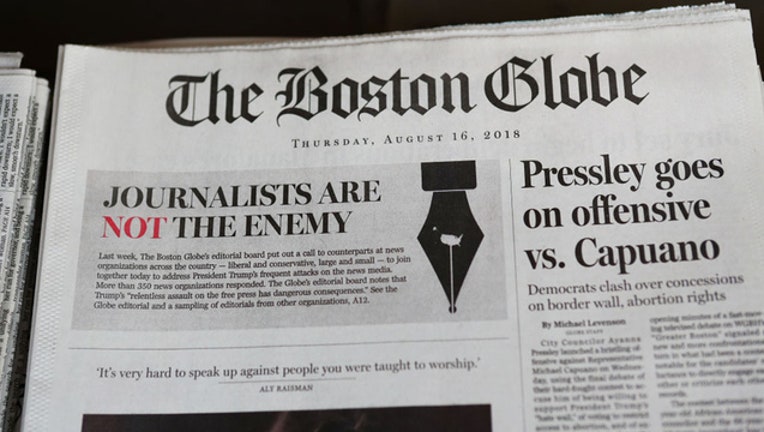 449a76b0-Boston Globe journalists editorials GETTY-409650