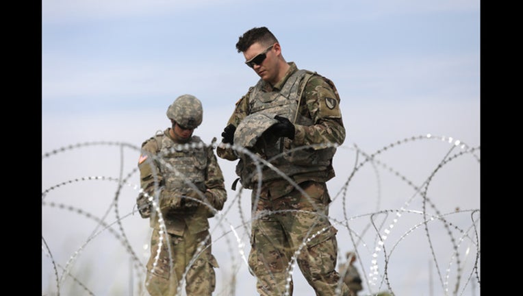 ca474f4f-775252533JM067_Troops_Arriv_1544472496989-405538