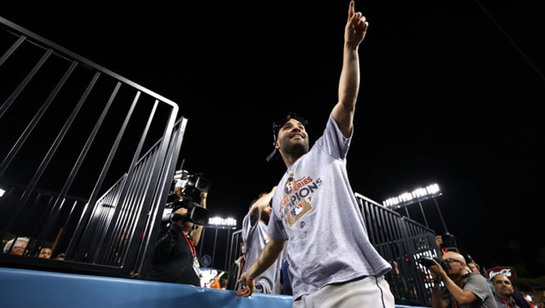 7fc21c15-getty_images_altuve_775063336TB00342_World_Seri_1510196169015