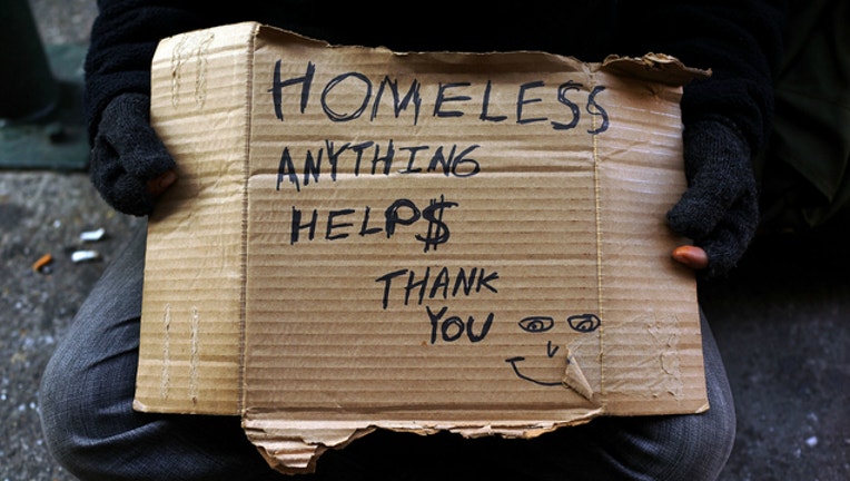 6f7ec387-HOMELESS SIGN GENERIC GETTY_1543716994365.jpg-401720.jpg