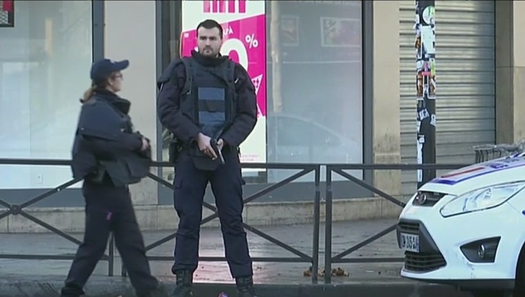 3928c6ca-Man with knife shot dead at Paris police station-402970