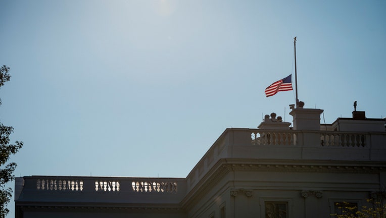 7d7aa810-MCCAIN-WHITE-HOUSE-FLAG-GETTY_1535336113259-401720.jpg