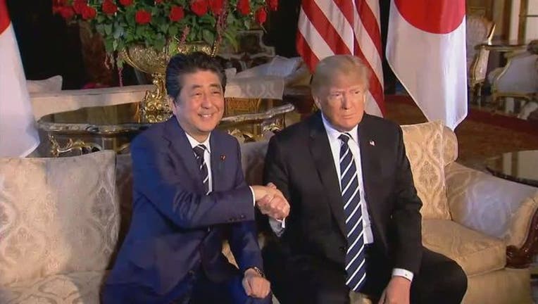 e21d9056-Japanese Prime Minister Shinzo Abe and President Donald Trump-401720.jpg