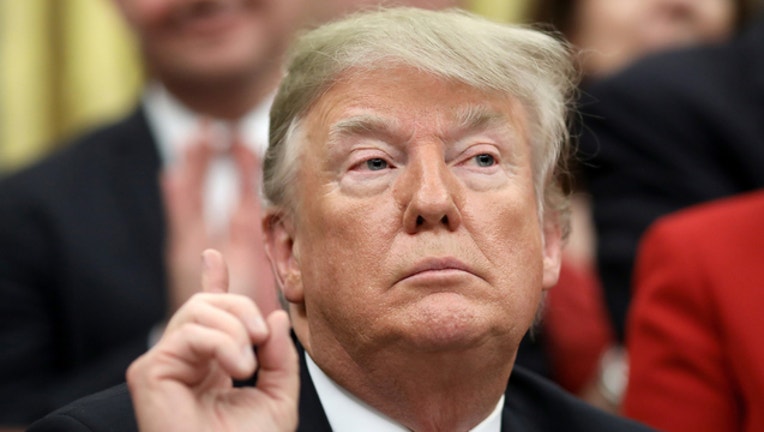 5cc237de-TRUMP GETTY_1545650123652.jpg-401720.jpg