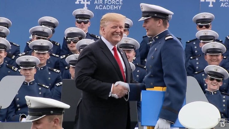 54d6cf4f-Time_lapse__President_Trump_salutes_each_0_20190530220042-401385-401385