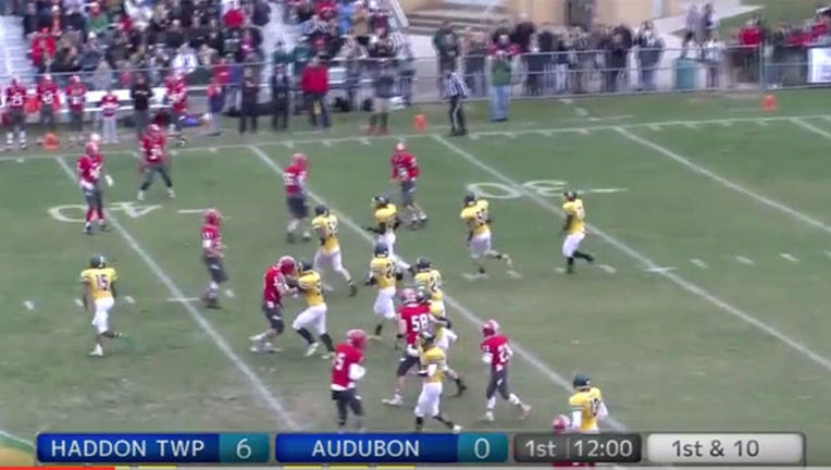 14448752-Player with Down syndrome scores touchdown-402970