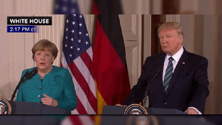 87d5c7c3-Trump-and-Merkel_1489779757841-407693.gif