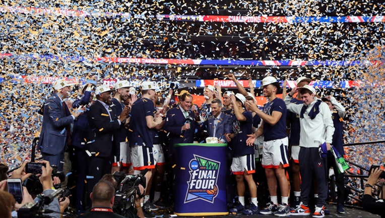 GETTY UVA men's hoops celebration 042619-401720