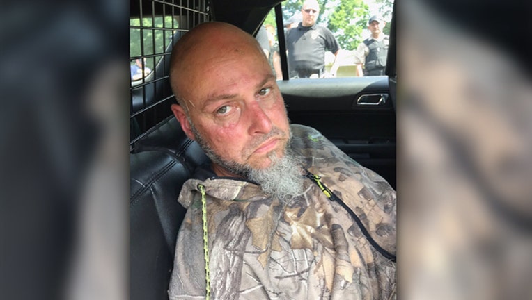 1b213168-inmate arrest-401385.jpg