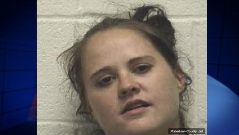 fb19bc45-Woman takes purse from crash scene_1469043937039-401096.jpg