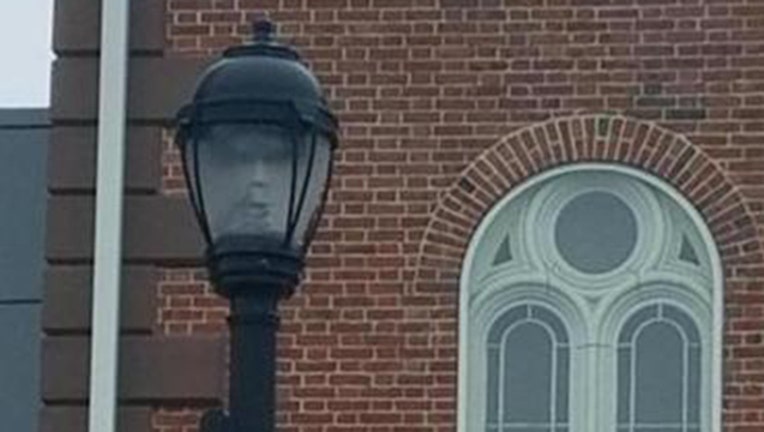 e1c52227-Face In Light Post-402970