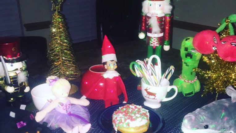 d6c26bd2-elf on shelf_1450965837919-407693.jpg