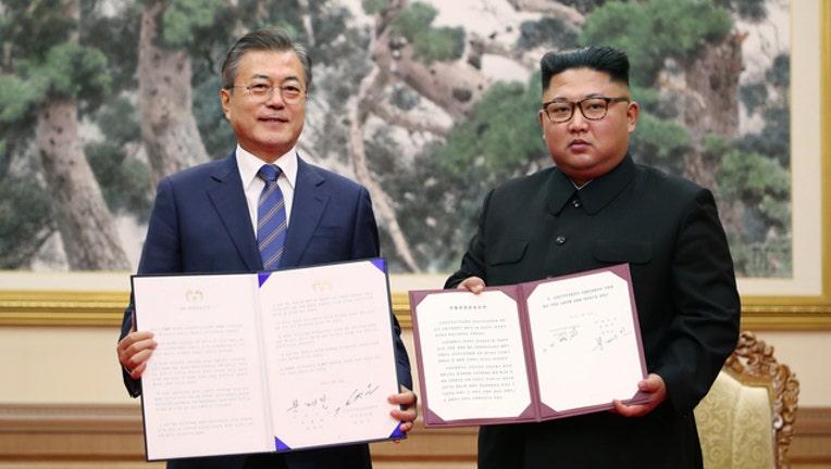 37596450-GETTY Jae-In and Jong Un 091918-401720