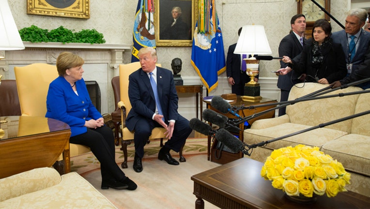 Trump and Merkel (GETTY IMAGES)-401720-401720