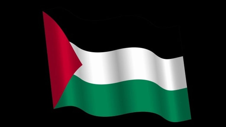 e269d750-palestine flag waving_1536769171192.png.jpg