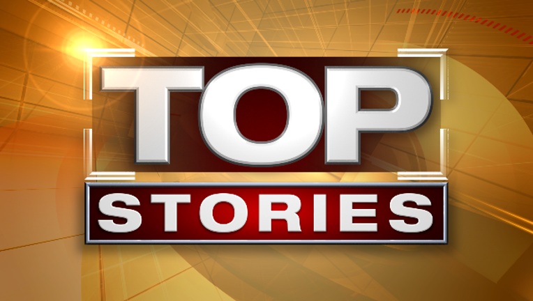top_stories_monitor_still_gold_orange_1443615642200.png