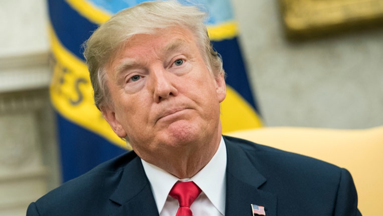 fc23b8d3-trump_getty_1507819207912-401720-401720.jpg