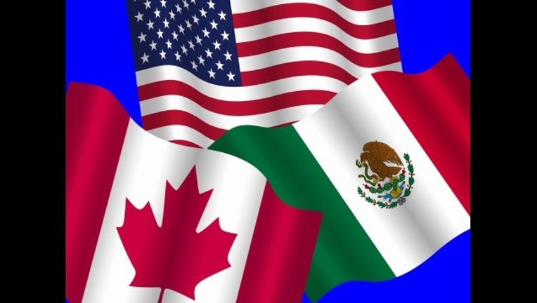 0c25a631-us mexico canada flags_1532563396822.png.jpg