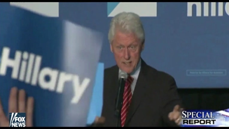 16f1105a-Bill Clinton Vs Protestors 6-401096.jpg