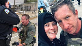 Man runs race in full SWAT gear, saves a life, then proposes -- all in a matter of moments