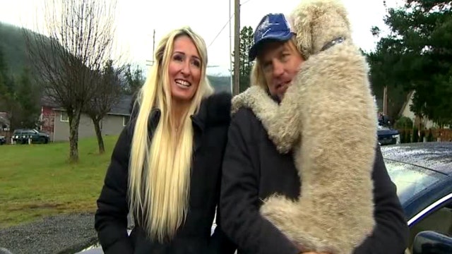 Beloved poodle reunited with owners after being taken by car thief