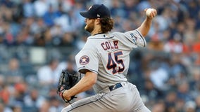 AP source: Yanks land ace Cole on record $324M, 9-year deal