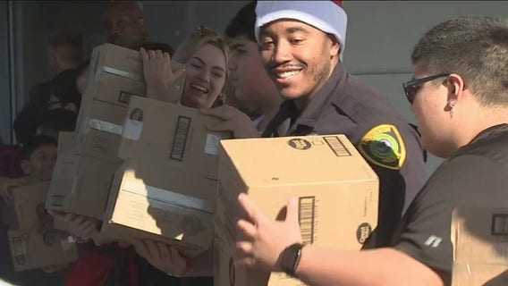 Houston area law enforcement officers band together to feed the hungry on Christmas