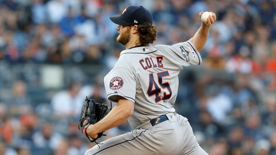 AP source: Yanks land ace Cole on record $324M, 9-year deal