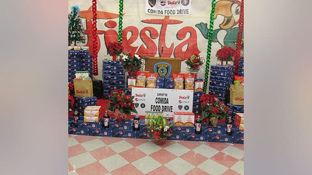HPD and Fiesta stores hold 34th annual Comida/Food Drive to feed families during the holidays