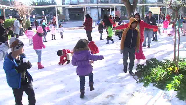 T.H. Rogers students play in 32 tons of snow