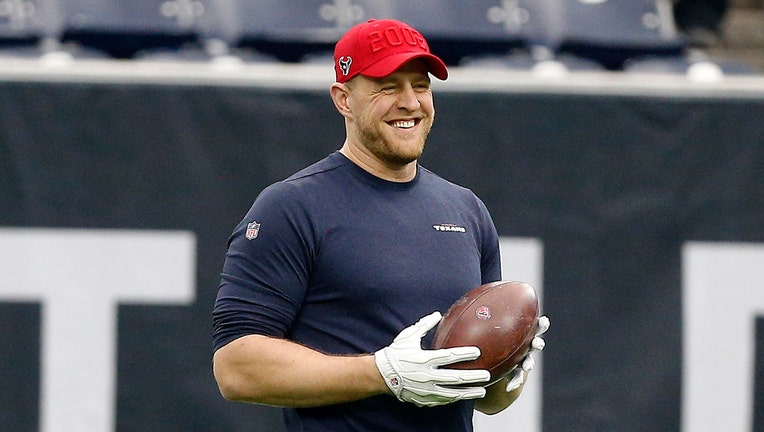 Houston Texans - Houston Texans defensive end J.J. Watt shows his Salute to  Service gloves as he warms up before the Week 9 win over Buffalo.