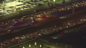 Law enforcement officer involved in motorcycle crash on Katy Freeway