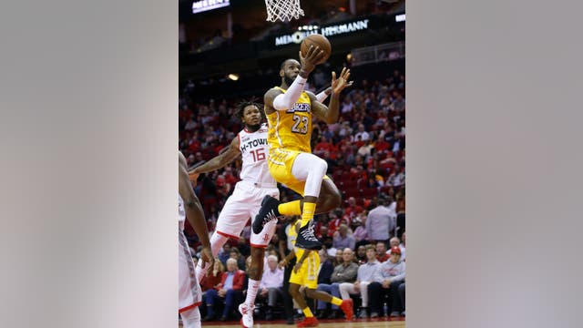 James scores 31 points, Lakers beat Rockets 124-115