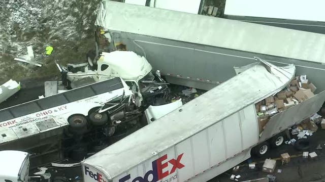 Investigators say bus passed truck before Turnpike wreck killing 5