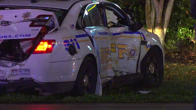 Harris County deputy’s car hit twice at intersection