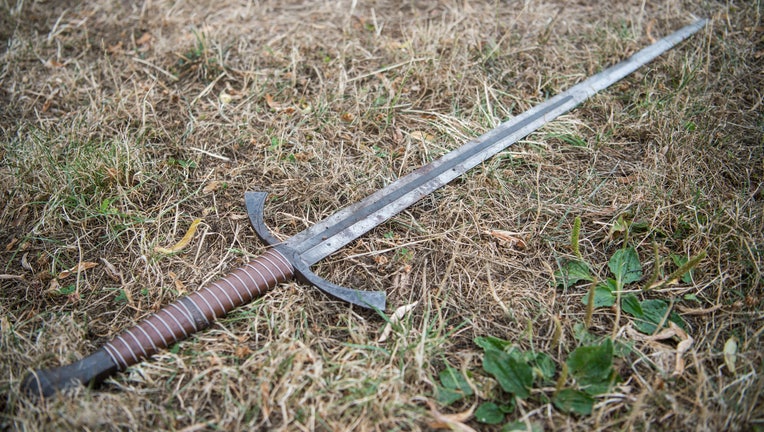 21 July 2018, Thuringia, Erfurt: A blunt sword of a free-fighter lies on the lawn. Photo: Arne Immanuel Bänsch/dpa (Photo by Arne Immanuel Bänsch/picture alliance via Getty Images)
