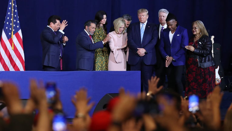MIAMI, FLORIDA - JANUARY 03: Faith leaders pray over President Donald Trump during a 'Evangelicals for Trump' campaign event held at the King Jesus International Ministry on January 03, 2020 in Miami, Florida. The rally was announced after a December editorial published in Christianity Today called for the President Trump's removal from office. (Photo by Joe Raedle/Getty Images)